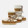 Evx Braune Mules aus Lammfell